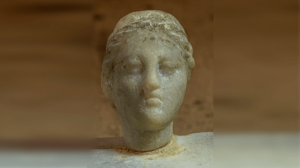 Ancient statue of Cleopatra VII, showcasing her beauty, power, and grace.
