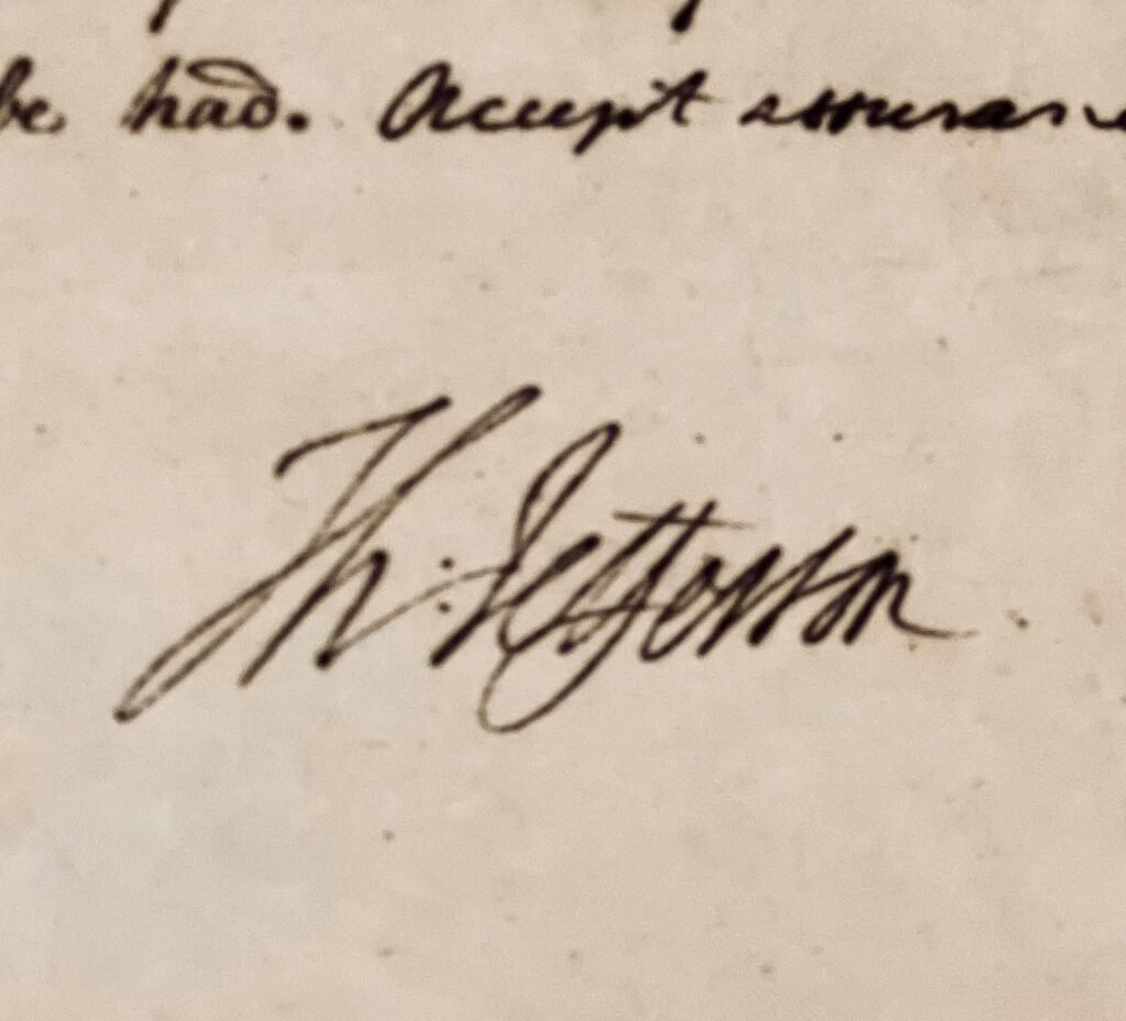 Close-up of the handwritten Declaration of Independence draft by Thomas Jefferson.