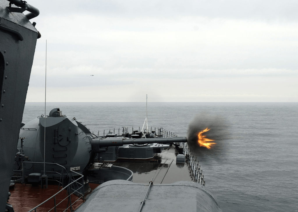  Russian Udaloy-class destroyer twin 130mm AK-130 guns in action during naval exercise